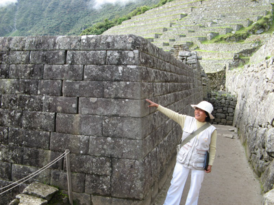 Top quality Incan stonework. Plus my guide, Wilma., Machu Picchu, Peru 2007