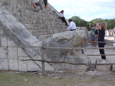 Snake head on Castillo stair, Chichen Itza, Mexico 2004