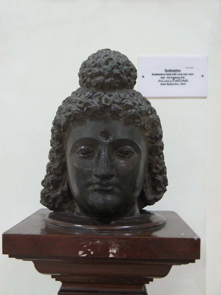 Peshawar, Peshawar Museum: Bodhisativa 2 c. A.D with curly hair.