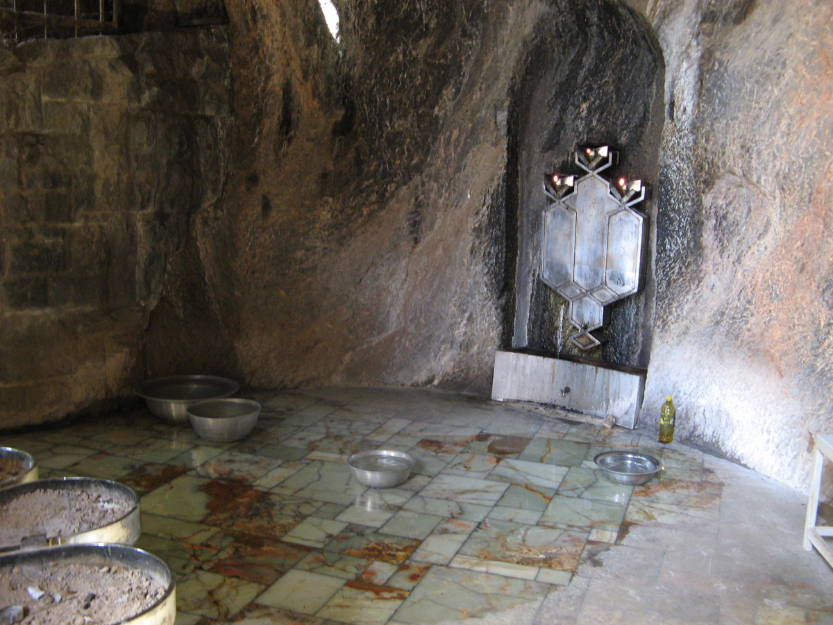 Yazd, Inside the Holy Shrine Catching the Holy Drips