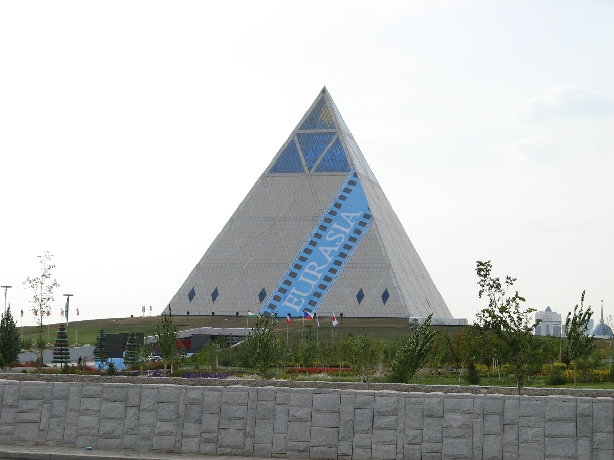 Astana, "Palace Of Peace and Concord" With Eurasian Film Festival banner.