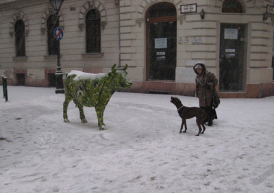 Dog distrusts steel cow, Budapest, 2009 Middle Europe