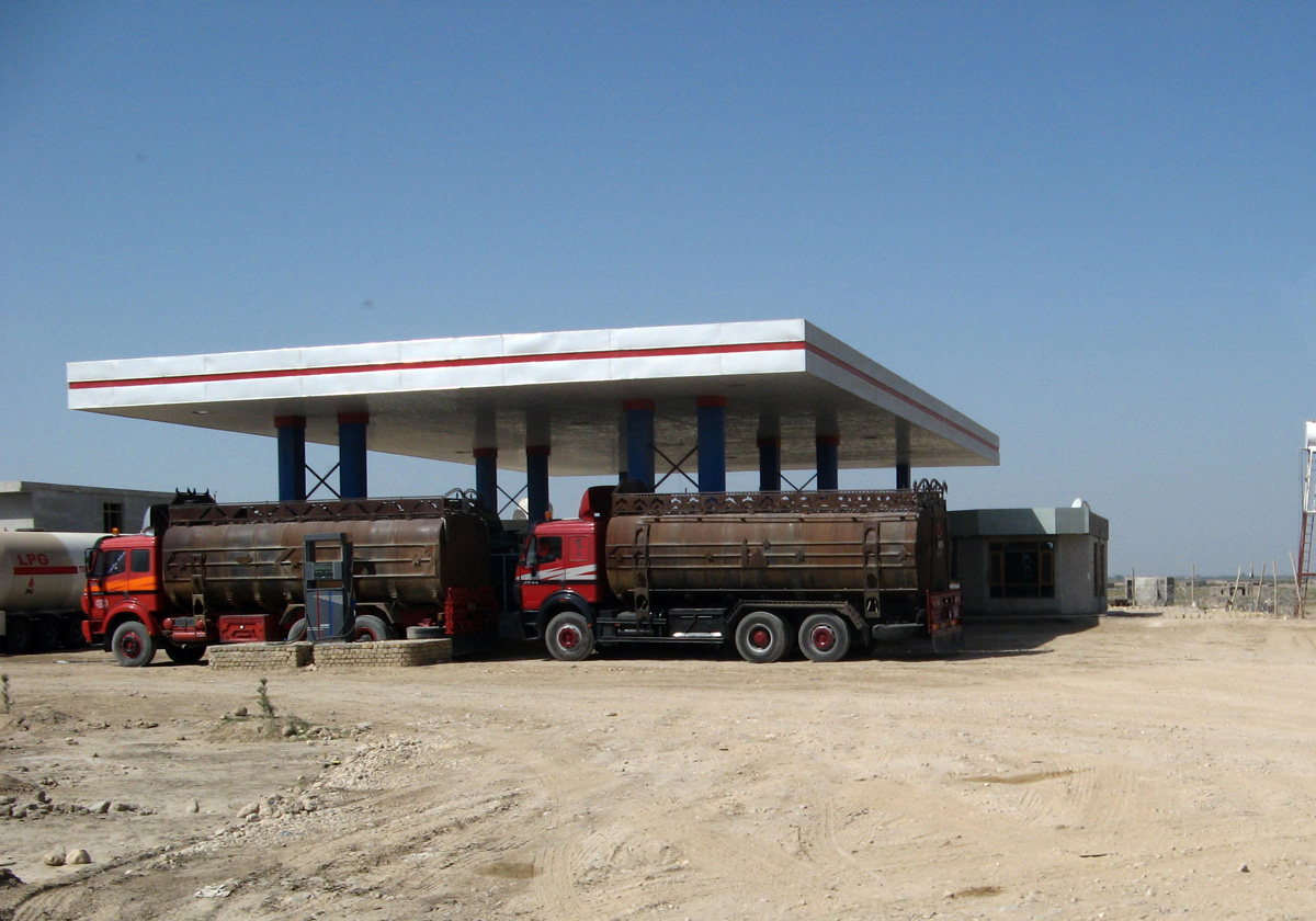 Friendship Bridge, Part of a vast herd of tankers. Transhipping oil off trains from Uzbekistan.