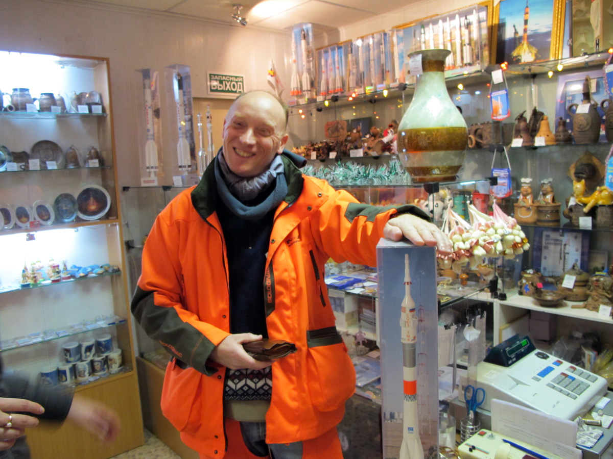 Baikonur City, Frenchman with model Soyuz After an arduous quest.