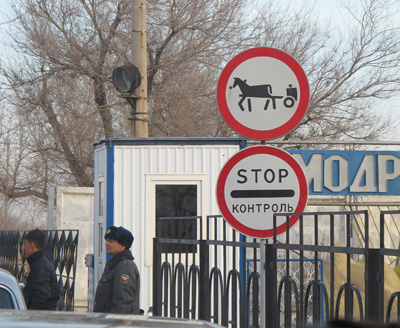 Enterering Baikonur City Home of cosmonauts and horse drawn car, Baikonur 2010
