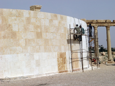 New outer wall for Theatre Workmen are using tools to "age, Palmyra, Syria 2010