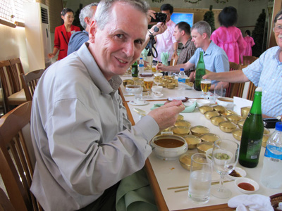Scotsman with Dog Meat Soup, Kaesong, North Korea 2011