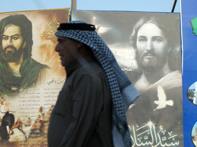 Contrasting religious posters., Baghdad, Central Iraq 2012