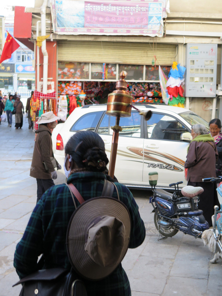 Around Lhasa, Prayer Wheel wielder