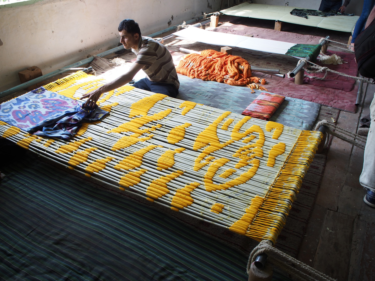 Margilan: Yodgorlik Silk Factory, Bundles of silk threads being prepared for dying.