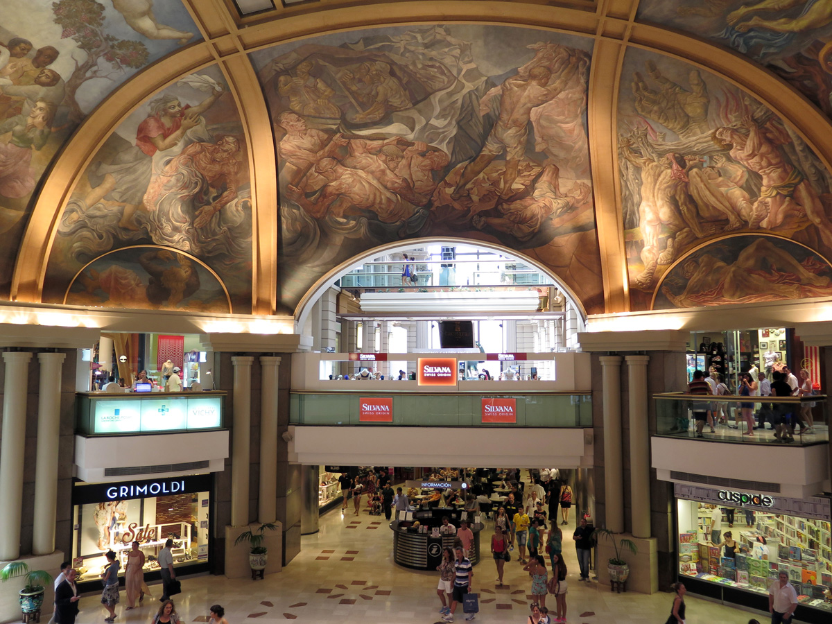 Buenos Aires, Galerias Pacifico Struggling workers above consumer excess