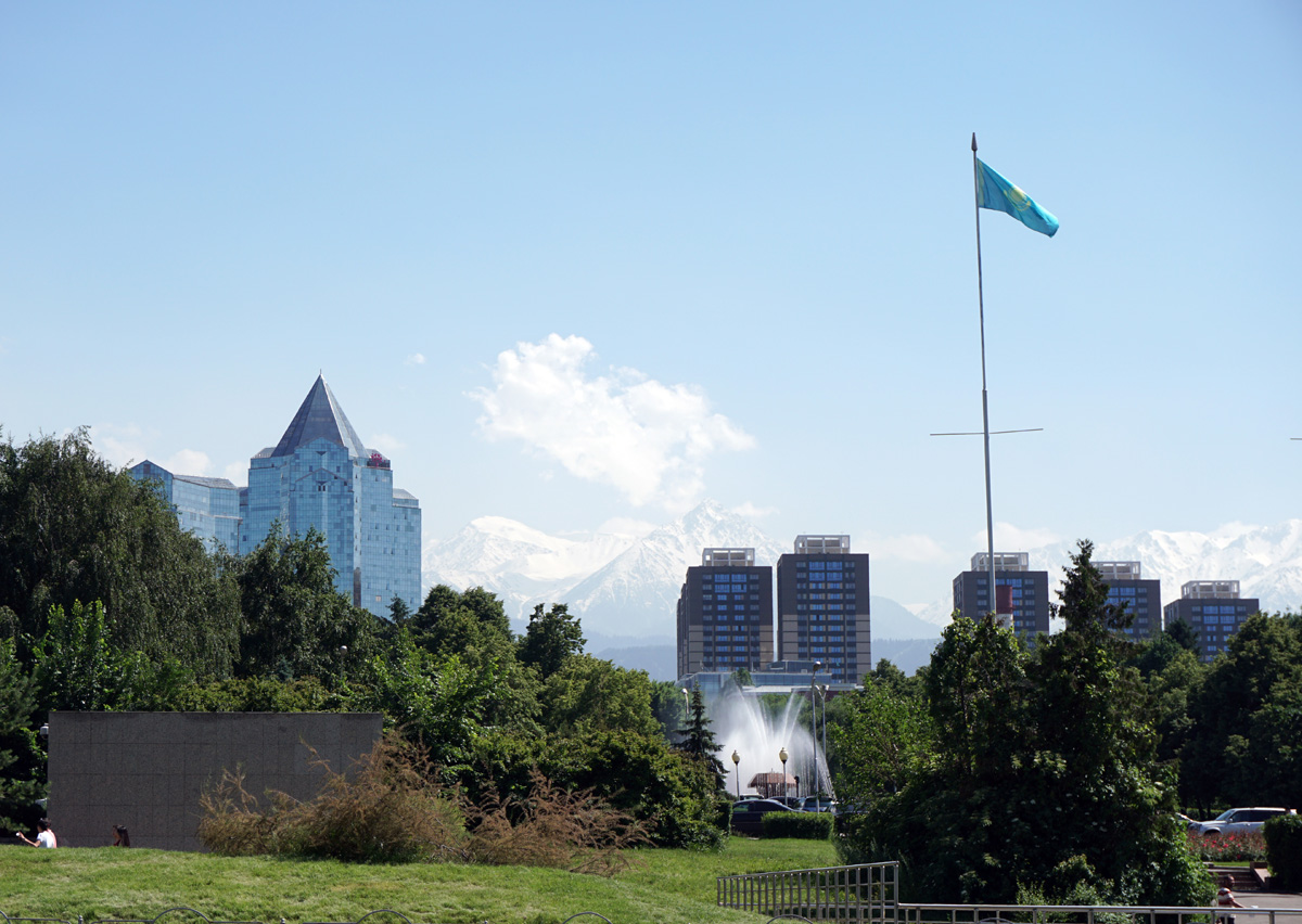Almaty-2, Modernistic building, distant Tien Shan mountains