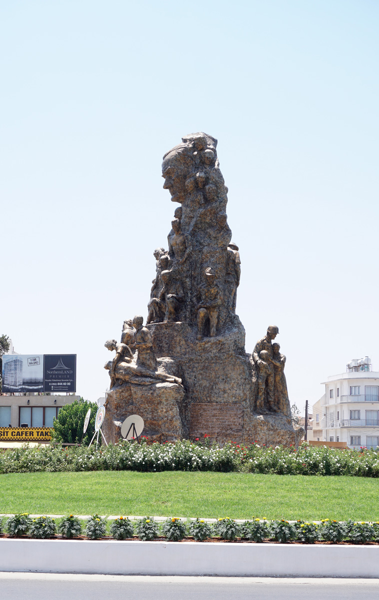 Around Famgusta, "Victory Monument" With an Ataturk face.