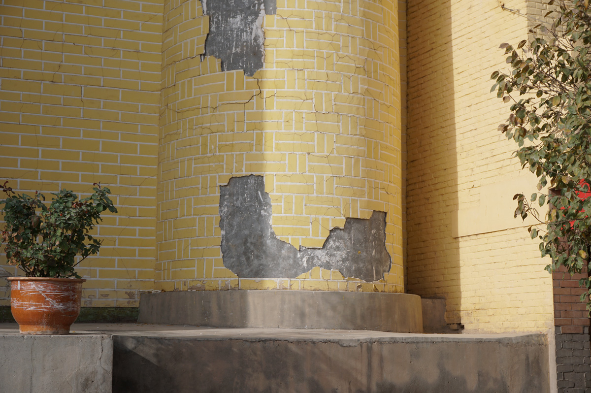 Around Kashgar, Sadly, the facade is plaster over concrete.