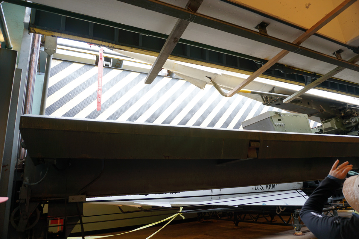 Down into the Magazine, Elevator raising missile to ground level