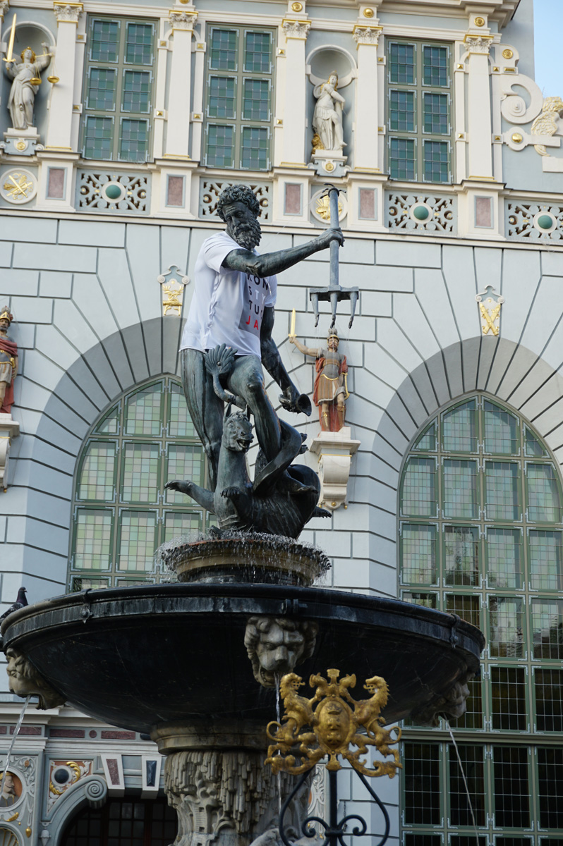 Statue of Poseideon, An awkward fish-tail "fig leaf"