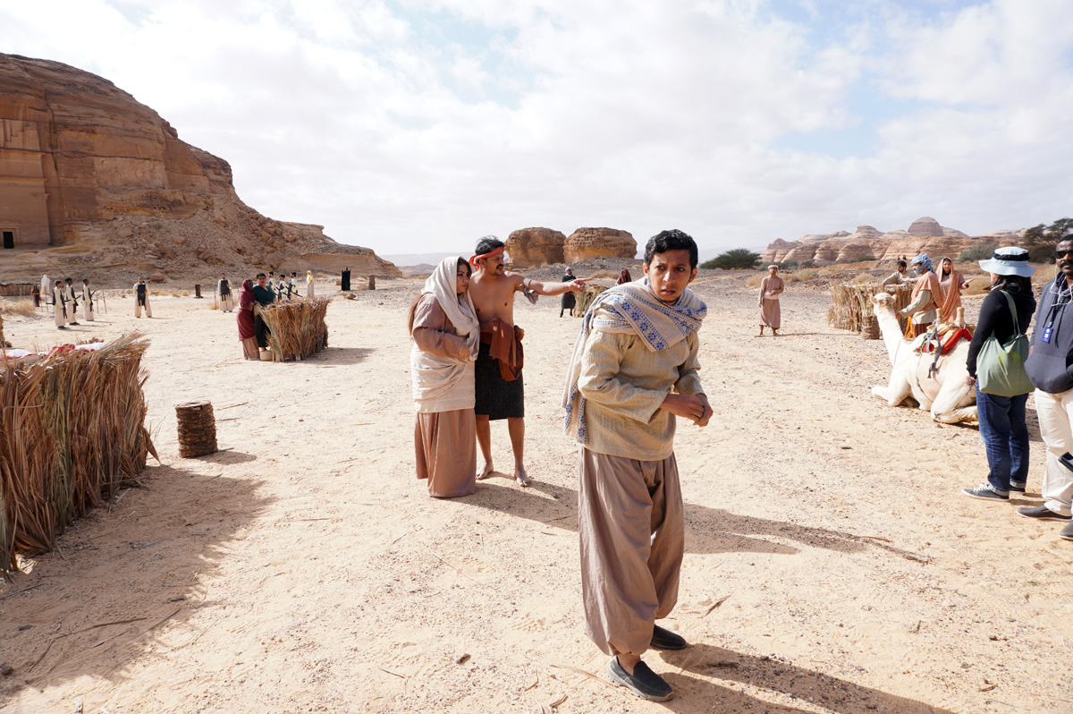 Madain Saleh: Immersive Play, The traders welcome exotic strangers!