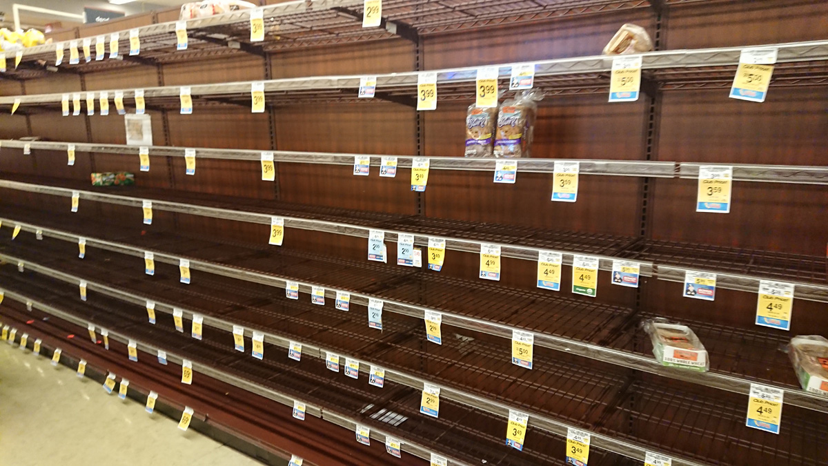 Pandemic, Mar 16th: Nearly empty bread section Just two loaves of raisin bread
