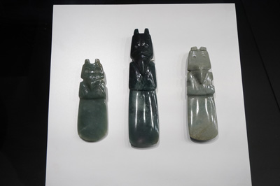 Amulets, with stylized human figures, San Jose: Jade Museum, Costa Rica, January 2020