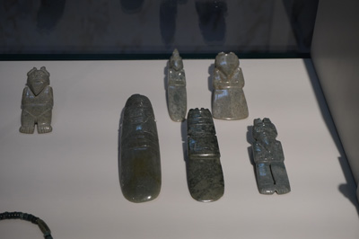 Amulets, with stylized human figures, San Jose: Jade Museum, Costa Rica, January 2020