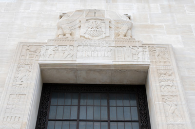 Some rather loaded symbolism in the doorway bas-reliefs Notice, Baton Rouge, Louisiana May 2021