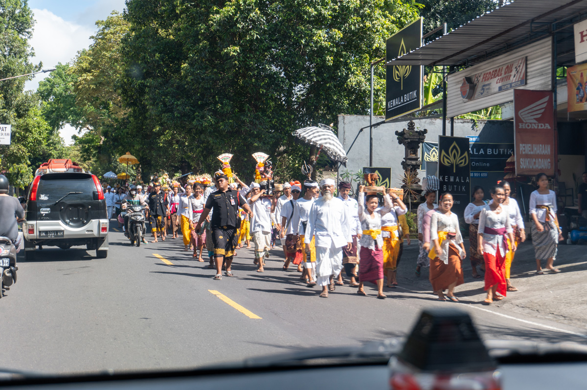 Lempuyang Temple, Passing a local procession on the road