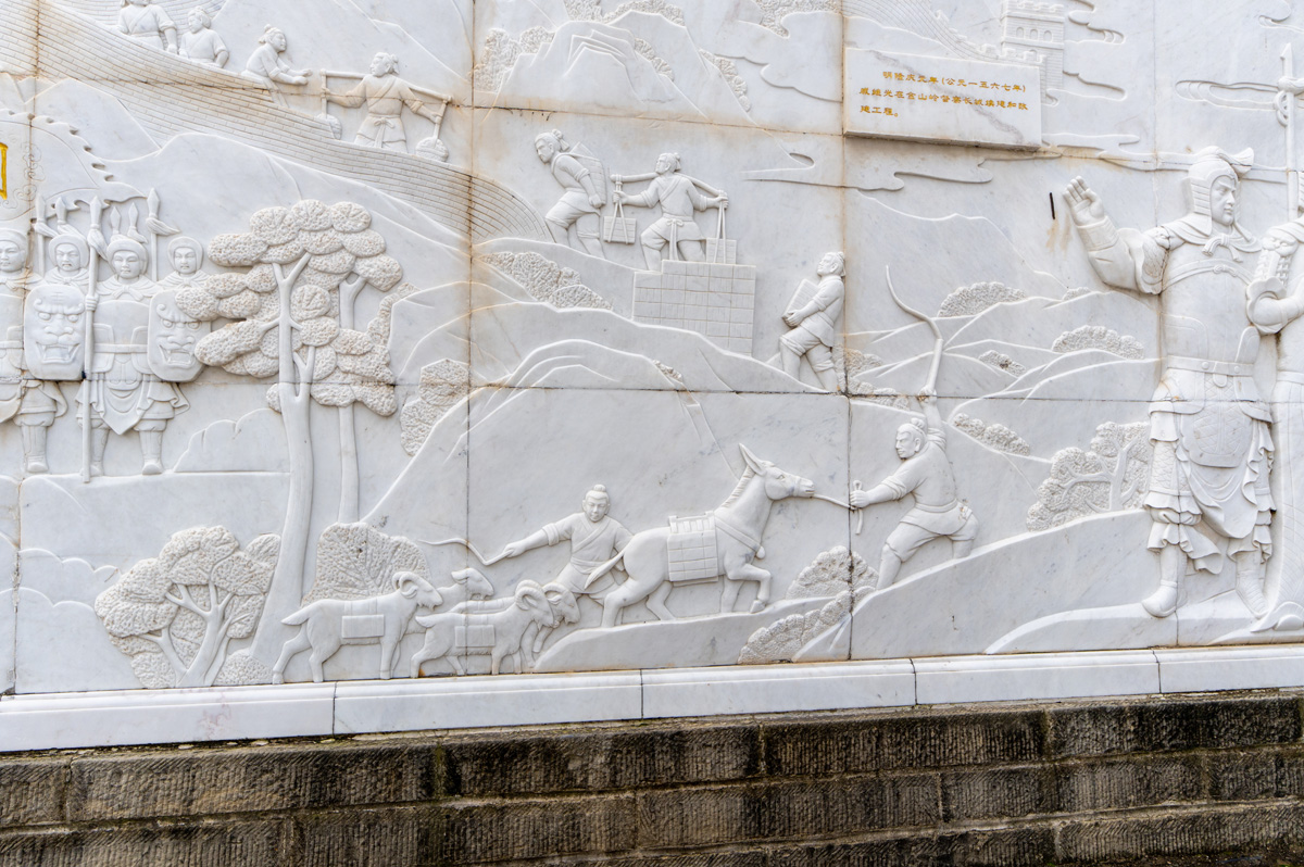 The Great Wall at Jinshanling, Workers build the Great Wall Goats and Donkeys carried stones at the bottom, humans higher up