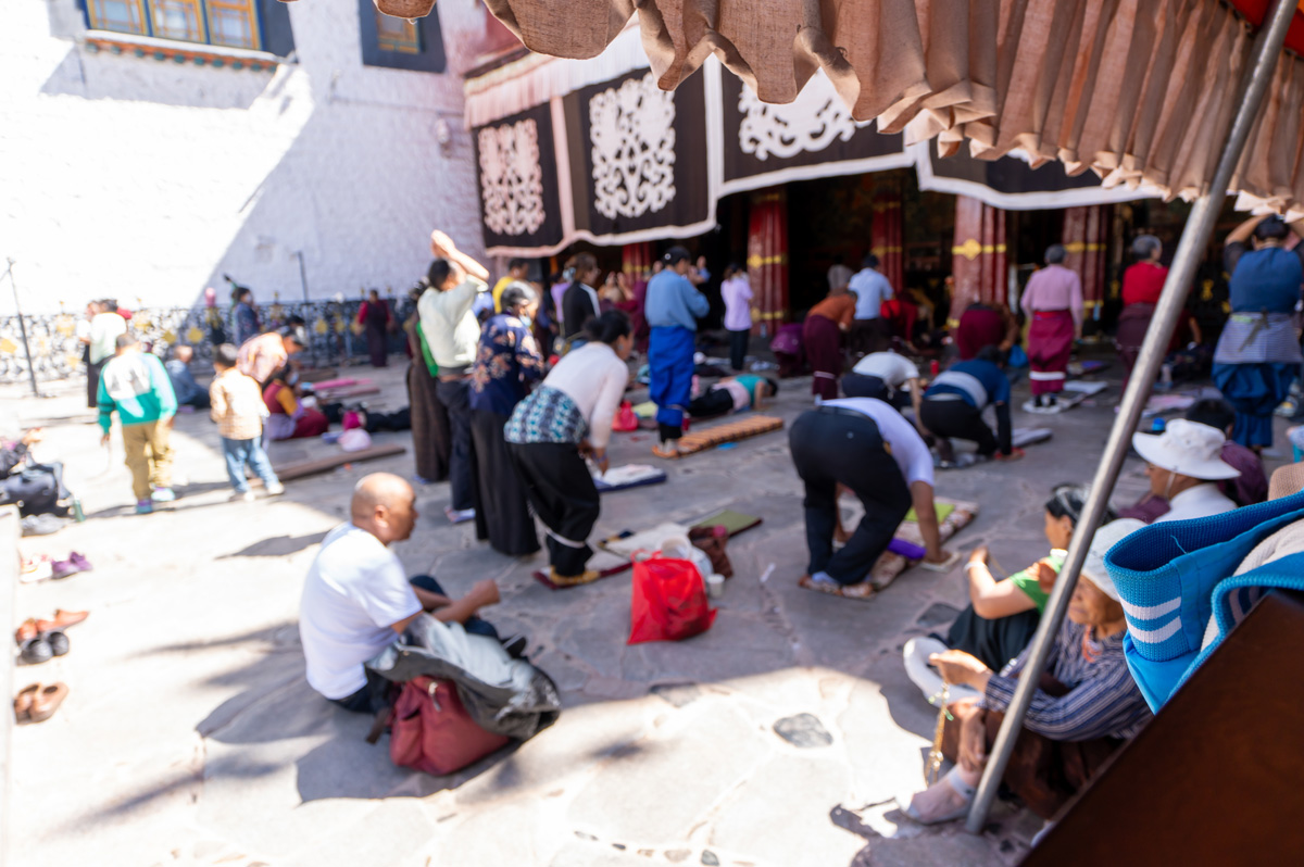Barkhor Square & Jokhang Monastery, Pilgrims approaching Jokhang