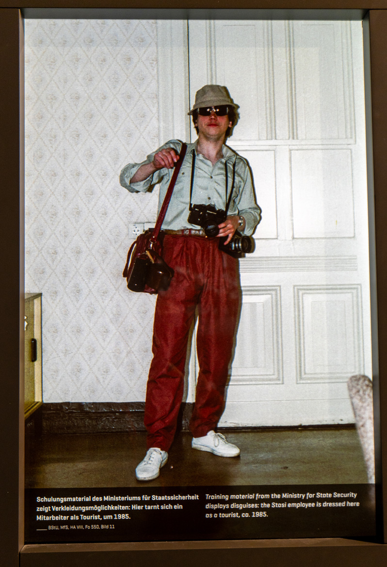 Berlin: Stasi HQ Museum, Stasi employeer disguised as a tourist ~1985) From a Stasi traning manual