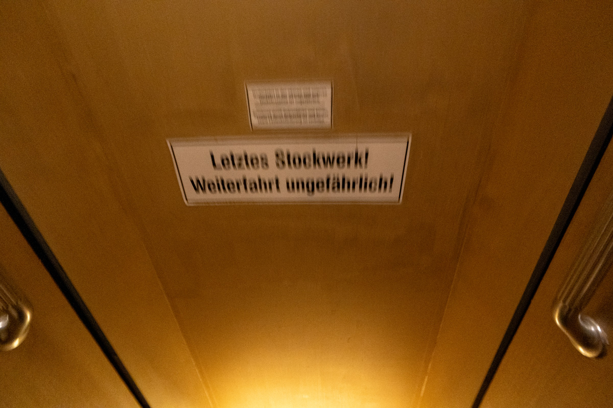 Paternoster Elevator, "Last floor!  It is safe to continue!"