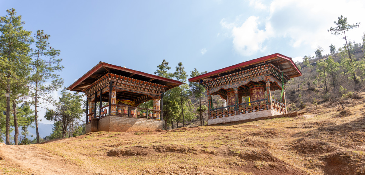 Around Paro, Drakarpo Lhakhang, Prayer Wheels The mountain is an important pilgrimage site.