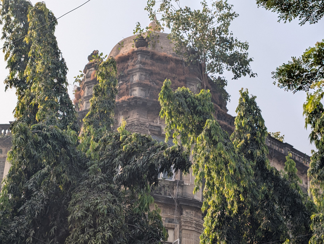 Mumbai, A mysteriously decayed grand dome The building below is still maintained and active