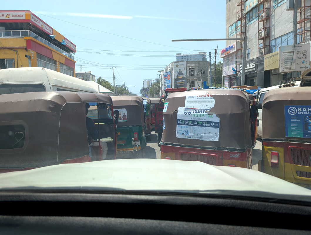 2025 Mogadishu, Caught in a Mogadishu traffic jam In a herd of tuk-tuks.