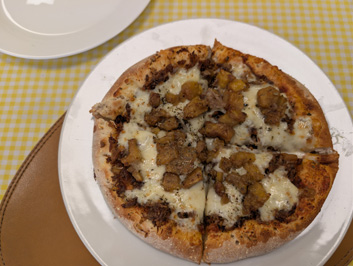 Pizza with beef and caramelized banana, Around Manaus, 2026 Brazil