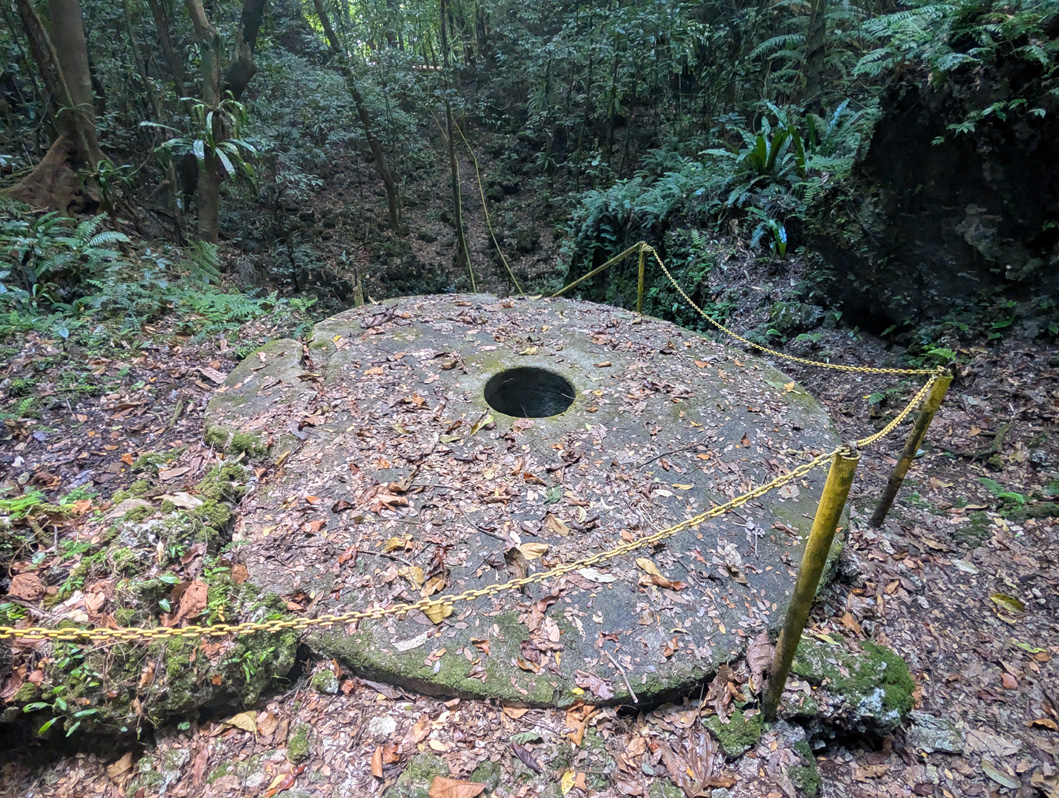 Palau: Stone Money Quarry, An abandoned piece of Stone Money