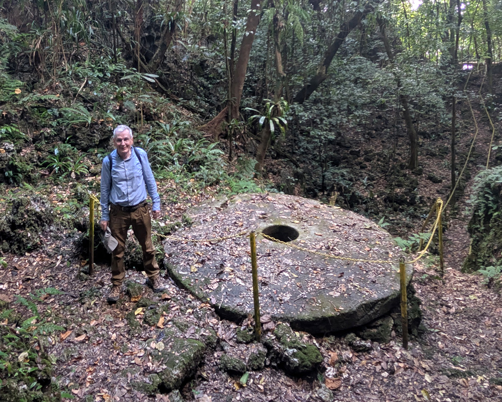 Palau: Stone Money Quarry, Graham with Stone Money
