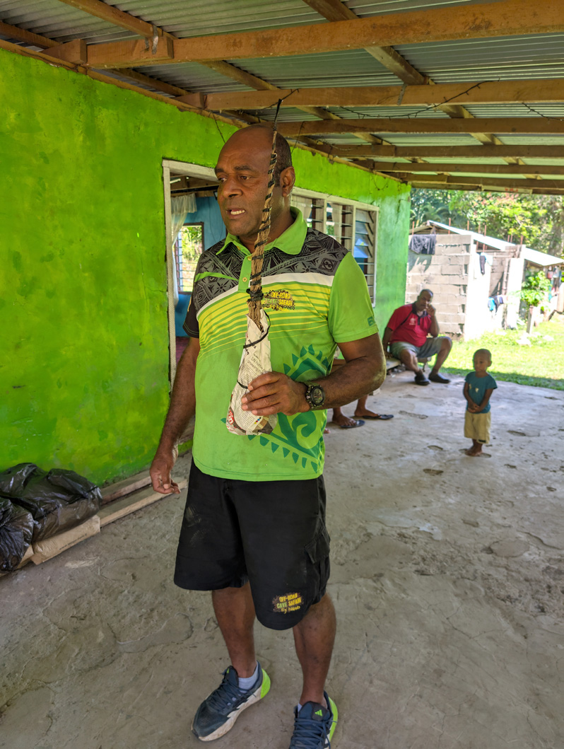 Fiji: "Tour to Cannibal Cave With Lunch", Our driver with Kava gift for Priest