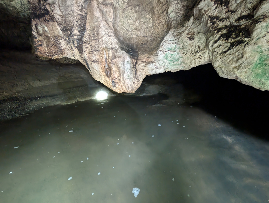 Fiji: "Tour to Cannibal Cave With Lunch", A low, watery, entrance